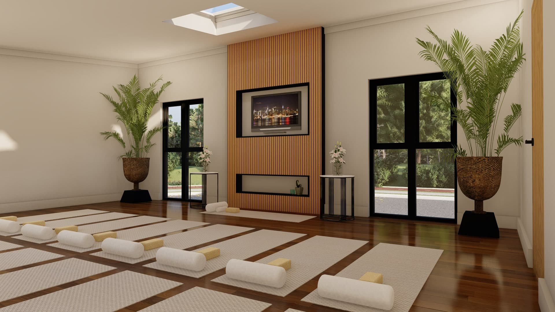 Three people stretching in a yoga studio